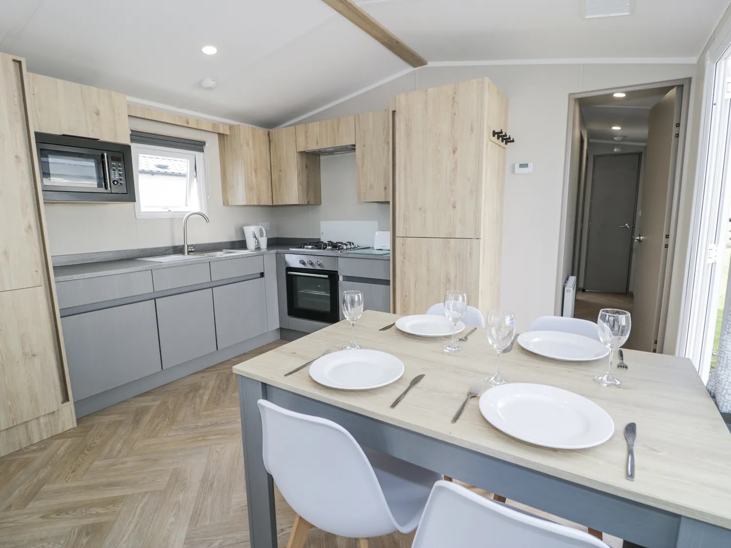 A kitchen and dining area in a lodge